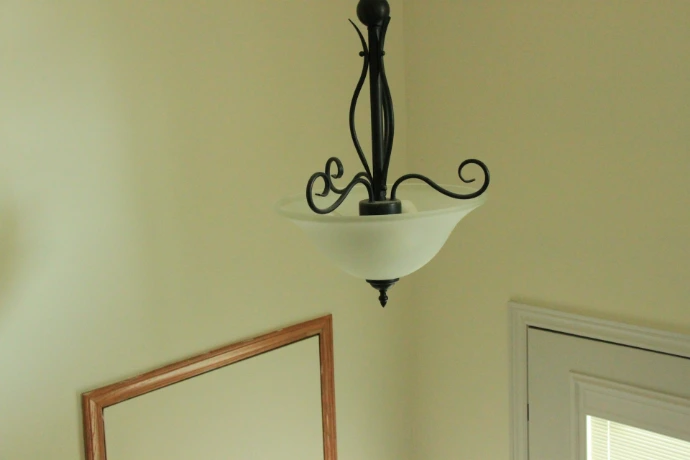 a light fixture from a ceiling